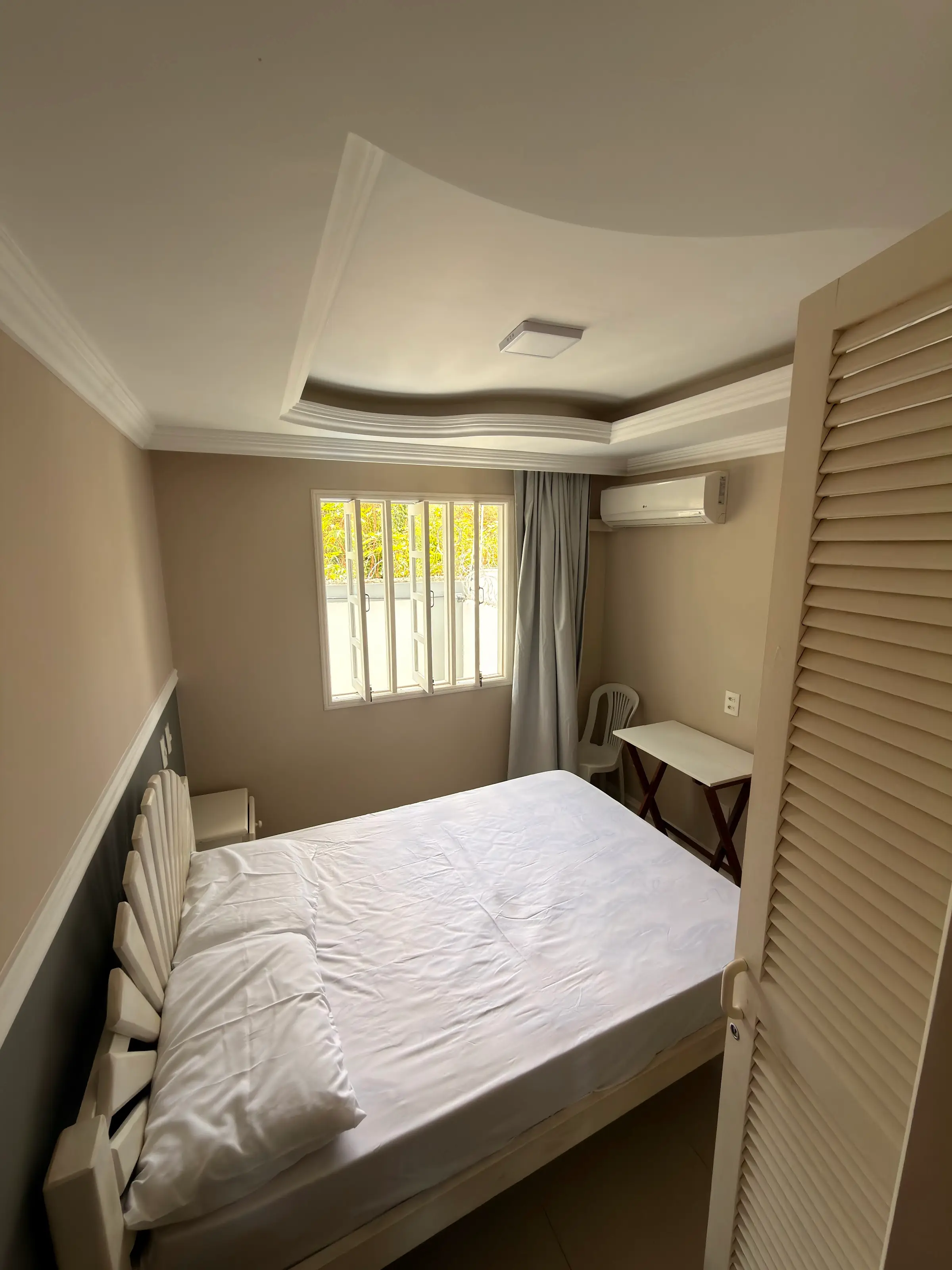Quarto de hóspedes com cama de casal