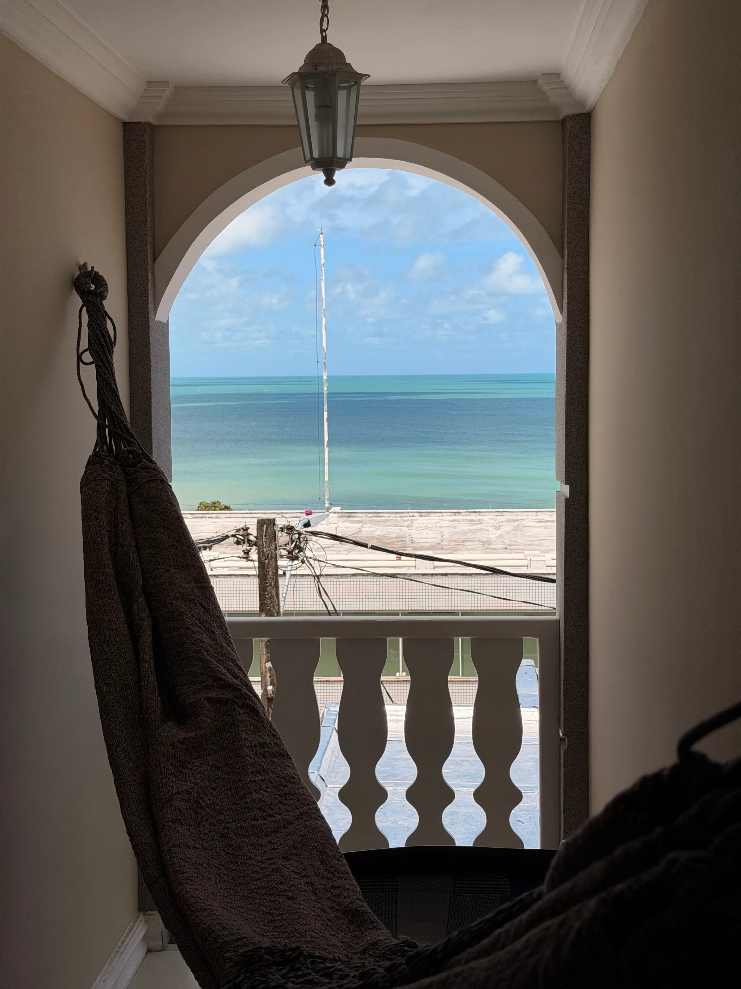 Balcony with hammock and sea view